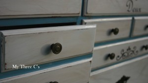 French Inspired Dresser. Blue frame and white drawers with original pulls. Distressed and Antiqued and decorated with French number script and Flur de Lis.